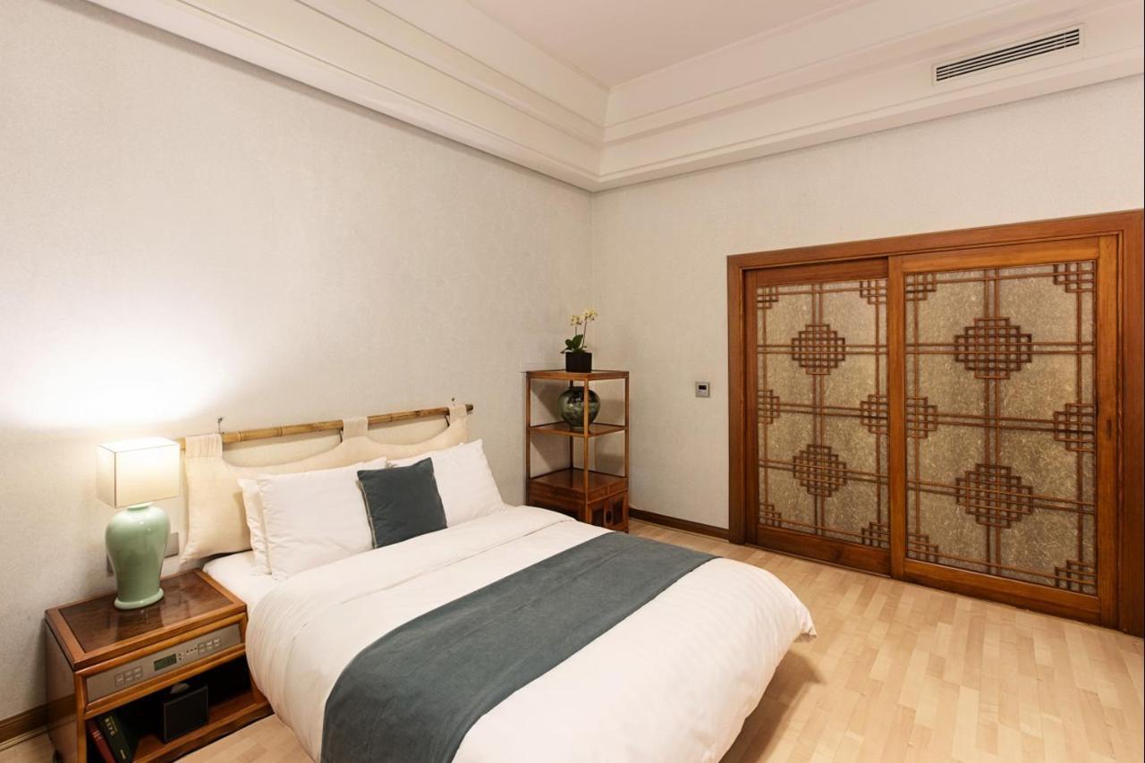 Haeundae Grand Hotel Пусан Екстериор снимка A bedroom at the hotel