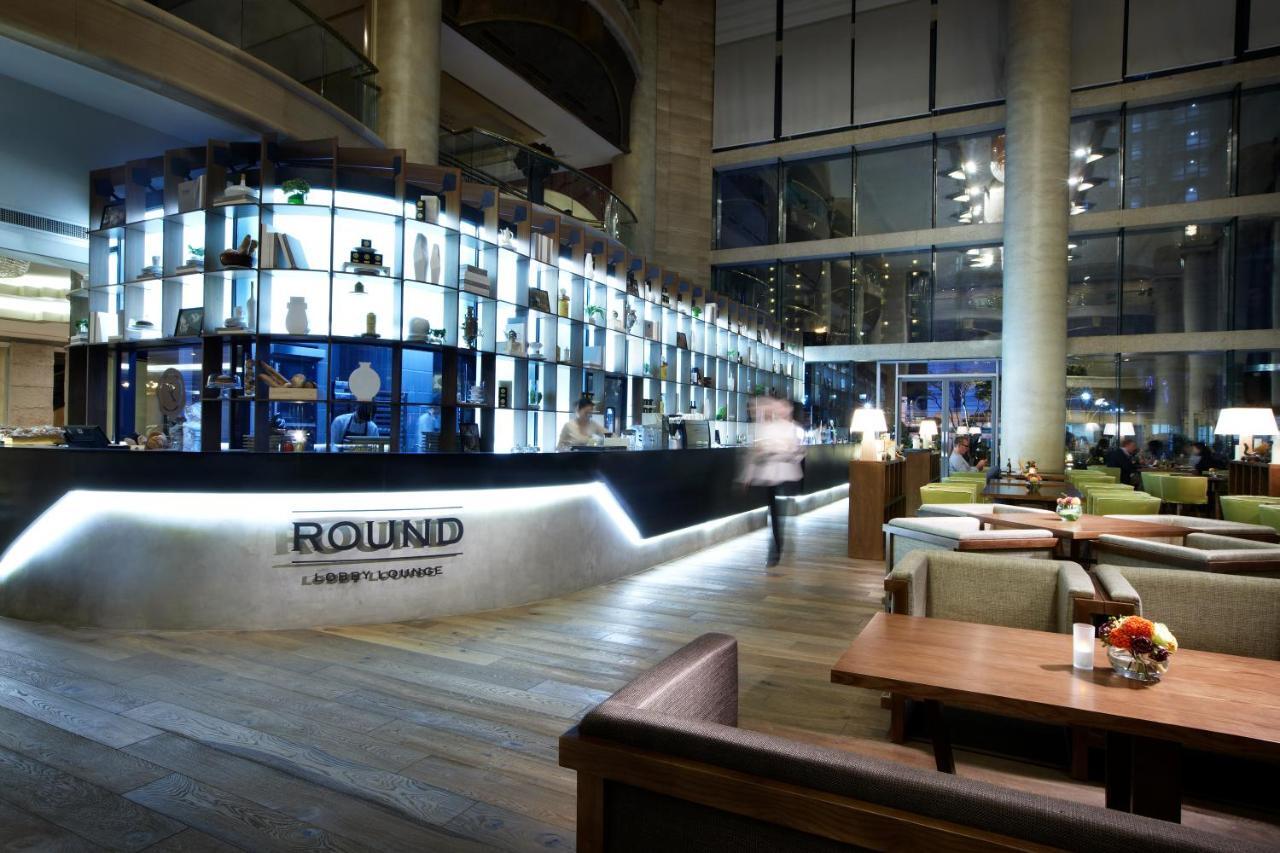 Haeundae Grand Hotel Пусан Екстериор снимка The Round Lounge at London Heathrow Airport